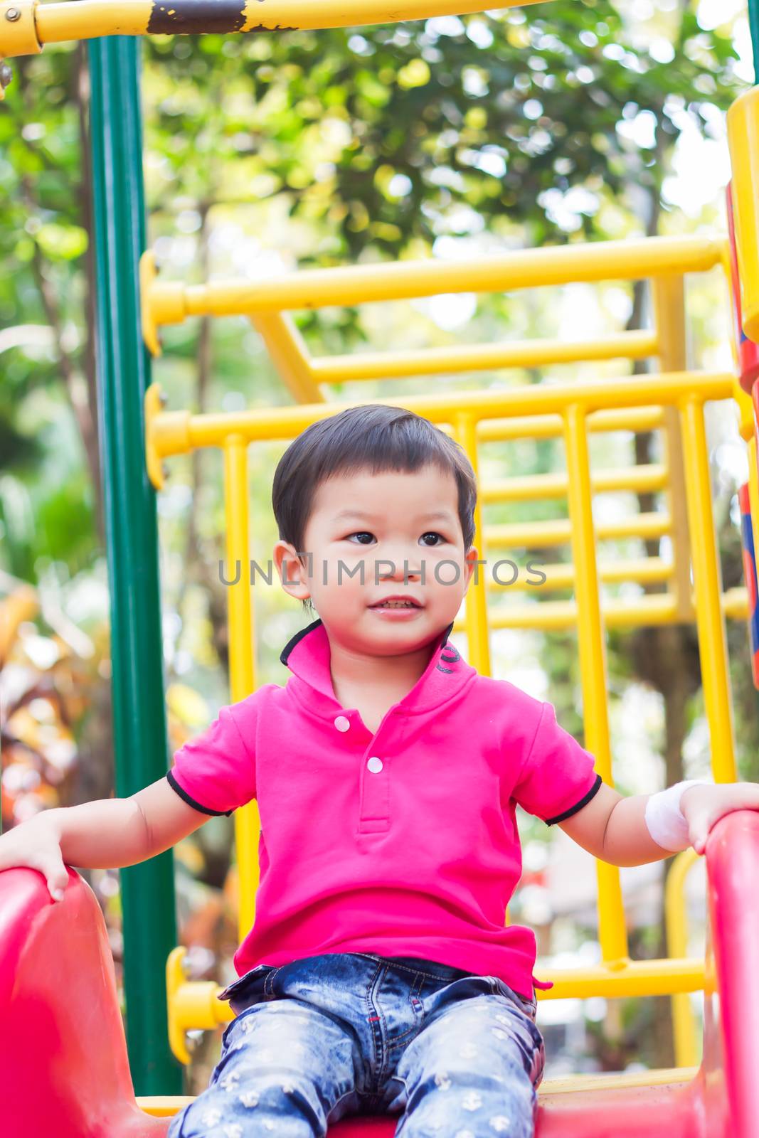 Asian boy relax in the park, stock photo