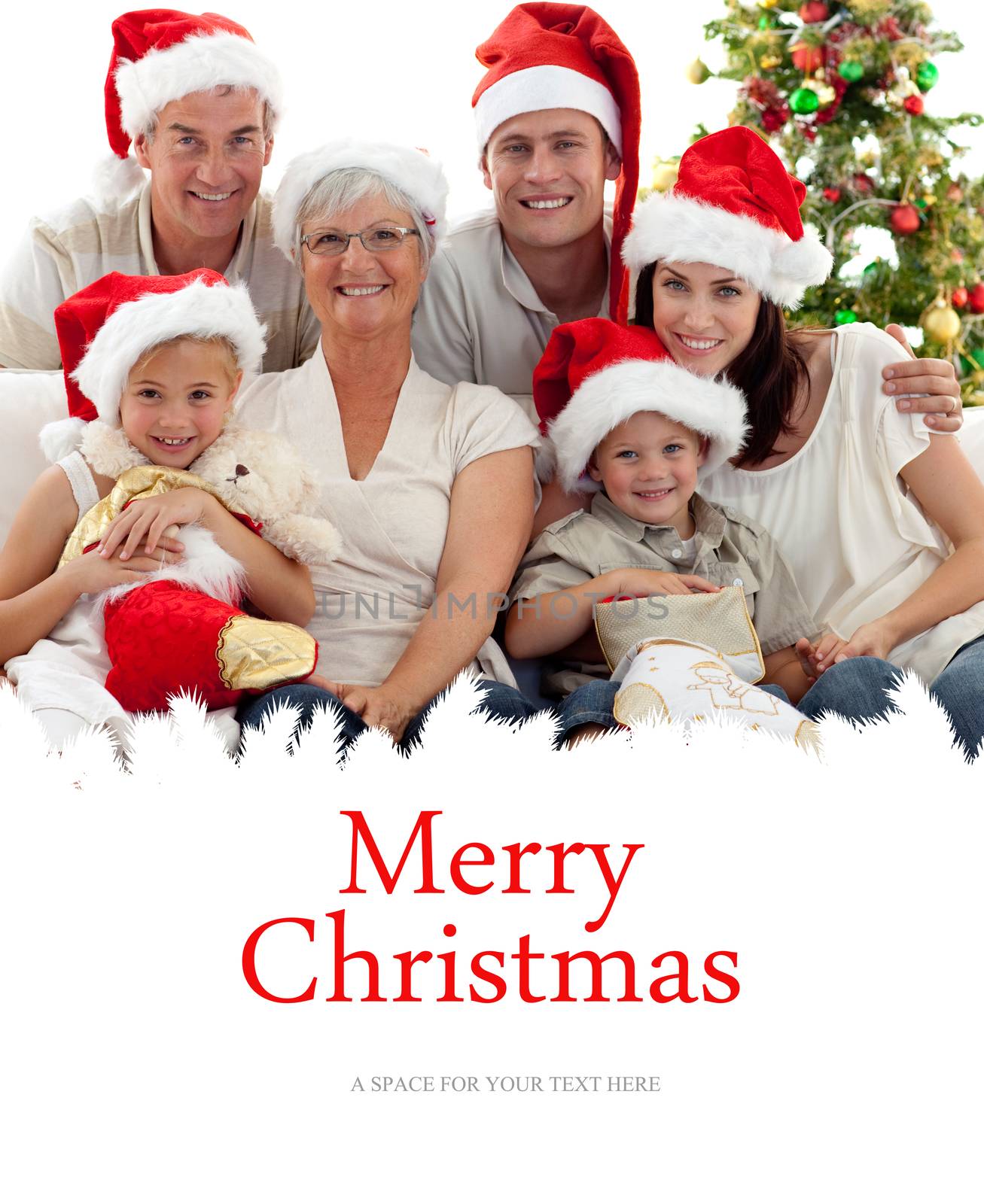 Children sitting with their family holding Christmas boots against merry christmas