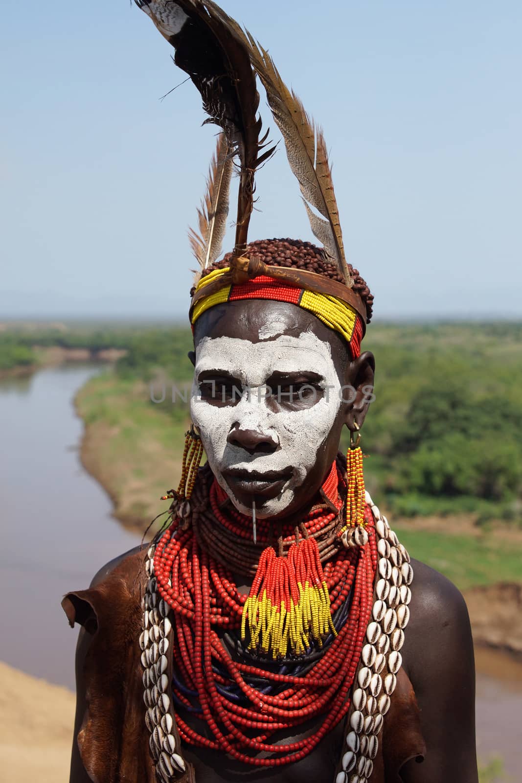 TURMI, ETHIOPIA - NOVEMBER 19, 2014: Karo people with traditional paintings on November 19, 2014 in Turmi, Ethiopia.