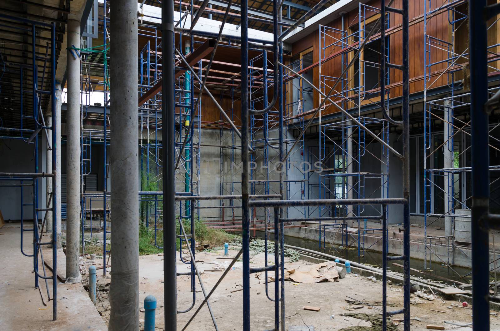 Courtyard of House under construction with scaffolding