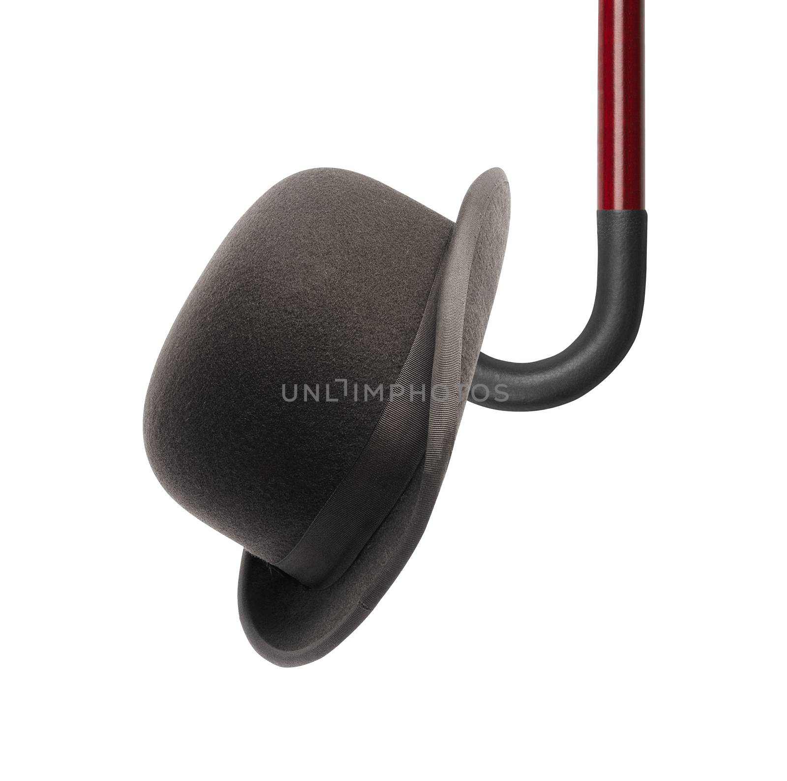 walking stick and black bowler cap