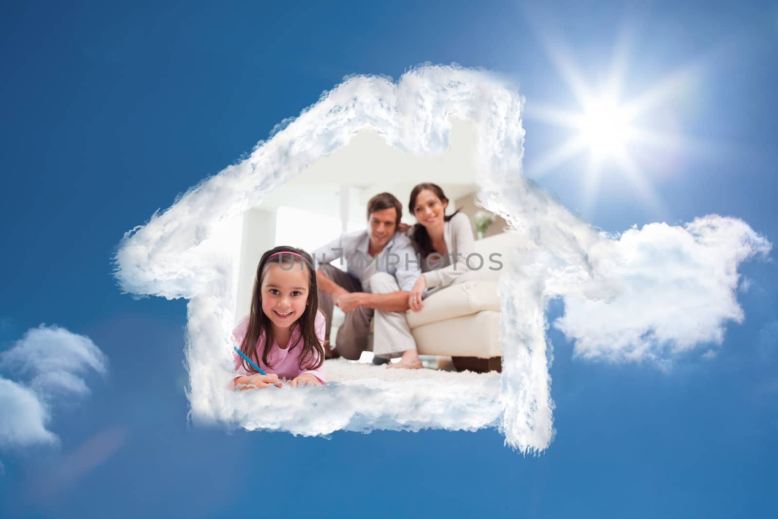 Cute girl drawing with her parents in the background against bright blue sky with clouds