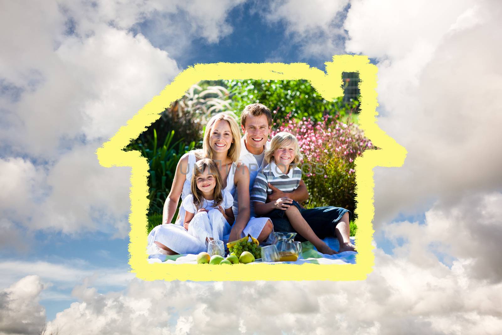 Composite image of cute family enjoying a picnic by Wavebreakmedia