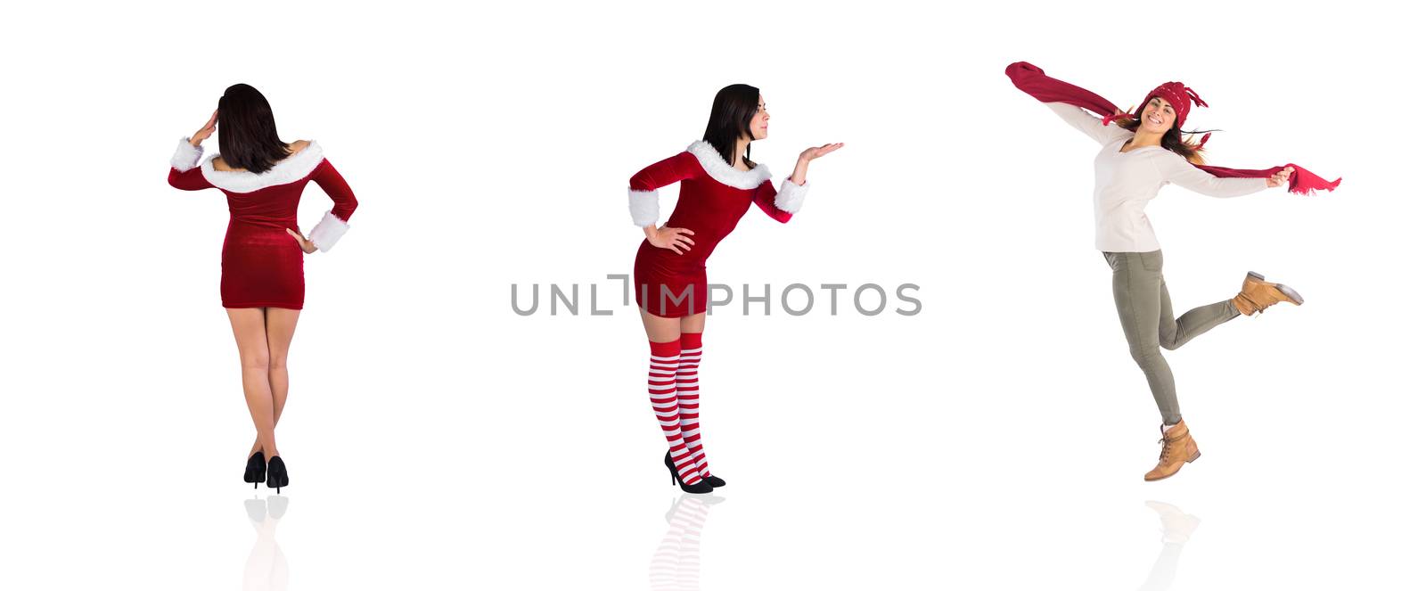 Composite image of different pretty girls in santa outfit  by Wavebreakmedia