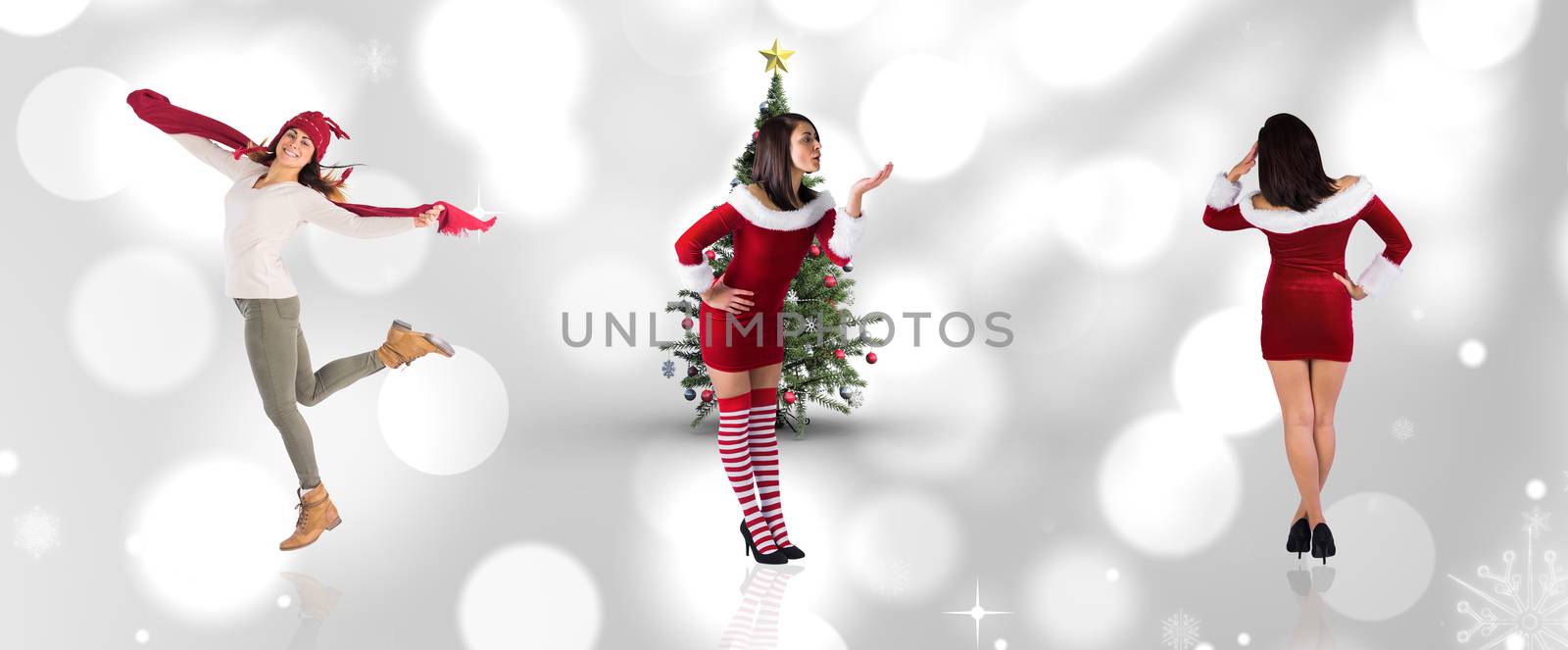 Composite image of different pretty girls in santa outfit  by Wavebreakmedia