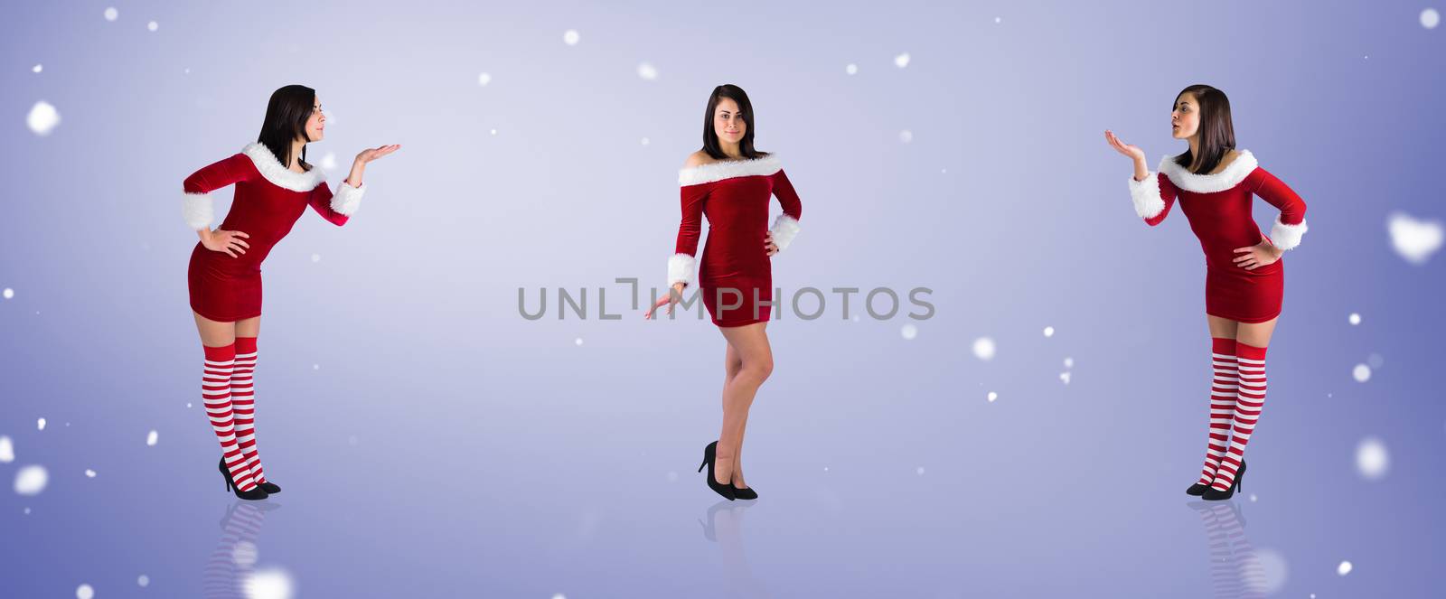 Composite image of different pretty girls in santa outfit  by Wavebreakmedia