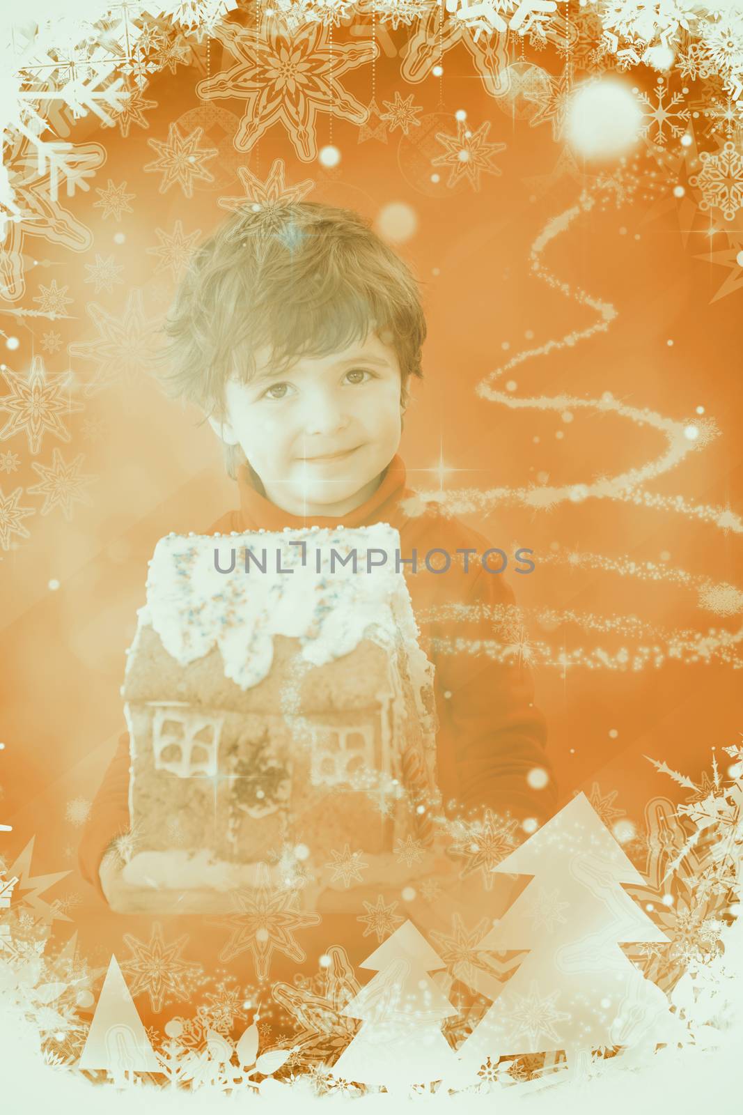 Festive little boy holding gingerbread house against glittering christmas tree design