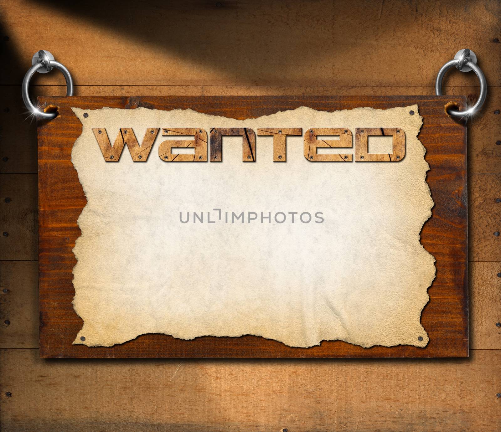 Dark wooden sign board with torn empty parchment with written wanted. Hanging on a wooden wall.