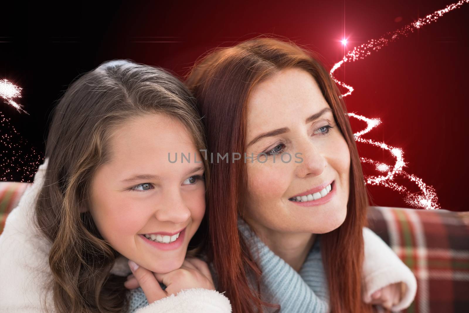 Mother and daughter against christmas light design