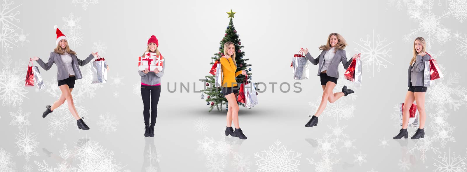 Stylish blonde holding shopping bags against white snowflake design on grey