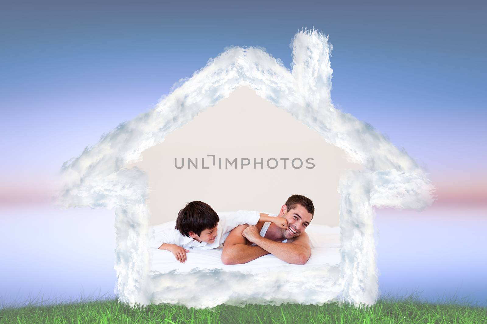 Composite image of father and his son having fun on a bed by Wavebreakmedia