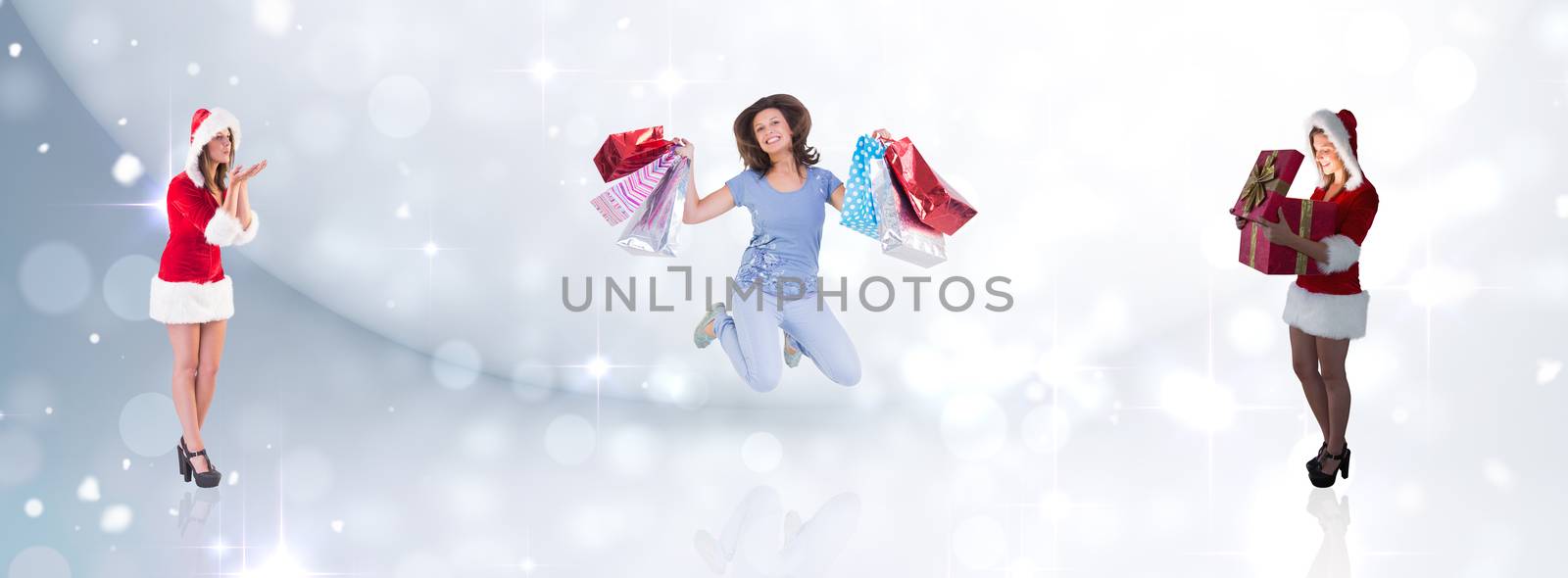 Composite image of santa girl opening gift by Wavebreakmedia