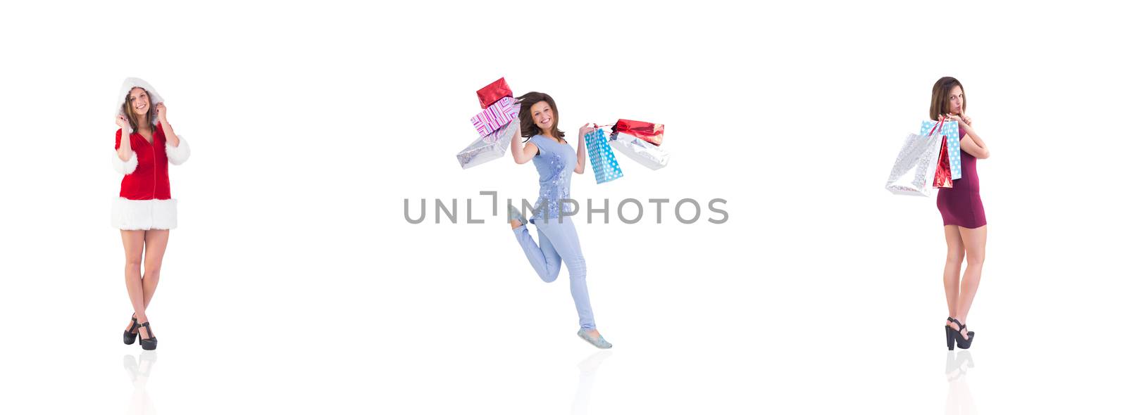 Composite image of pretty woman holding shopping bags with finger to her lips by Wavebreakmedia