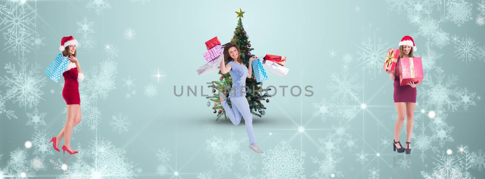 Composite image of pretty woman in santa hat opening a gift smiling at it by Wavebreakmedia