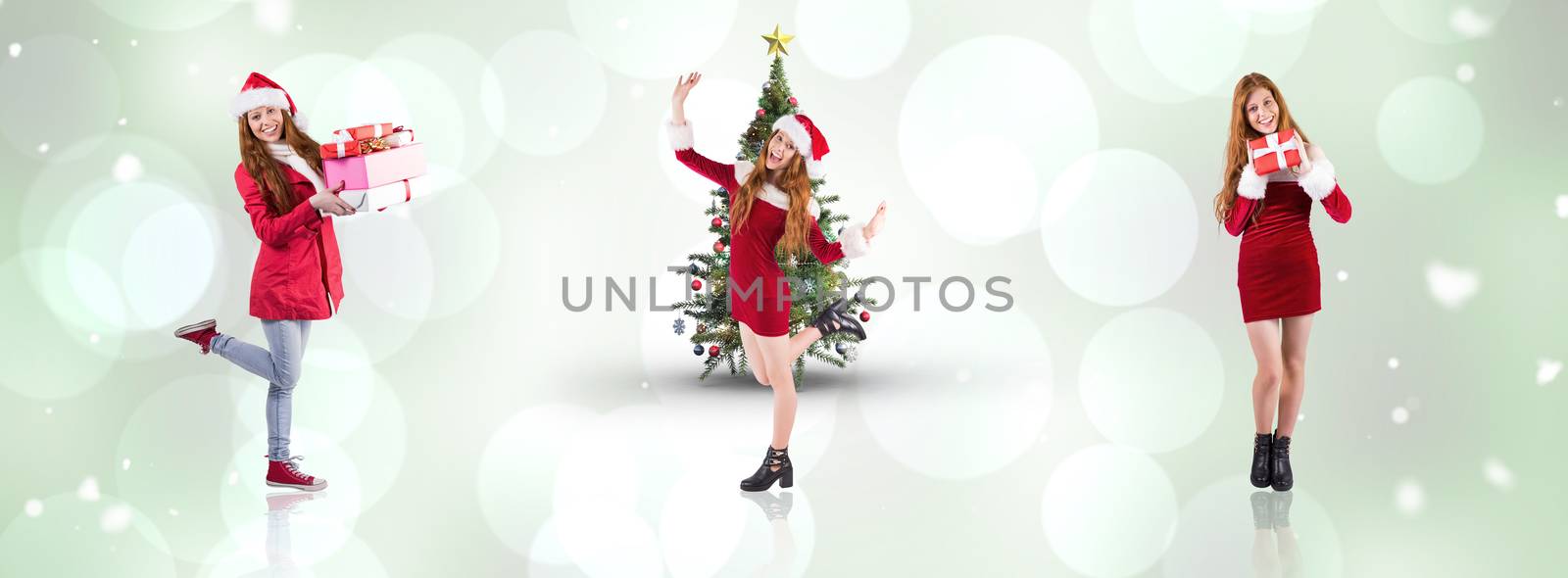 Festive redhead smiling at camera against grey abstract light spot design