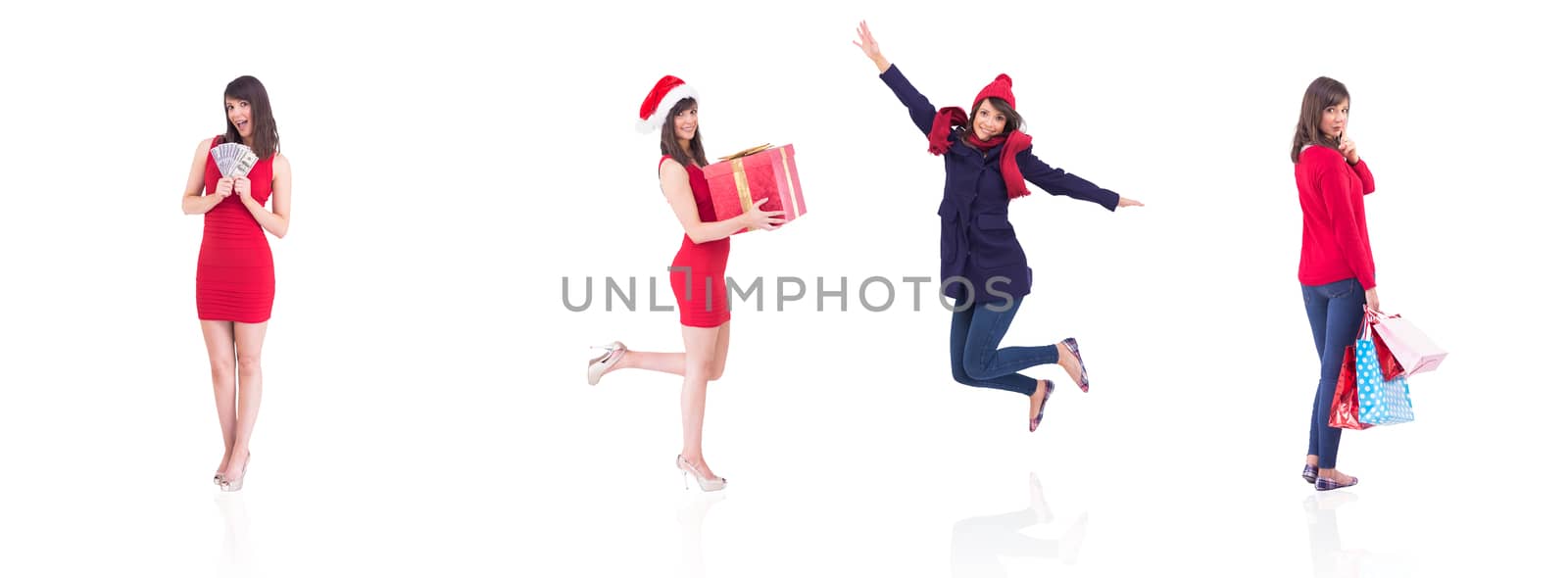 Composite image of festive brunette holding gift bags