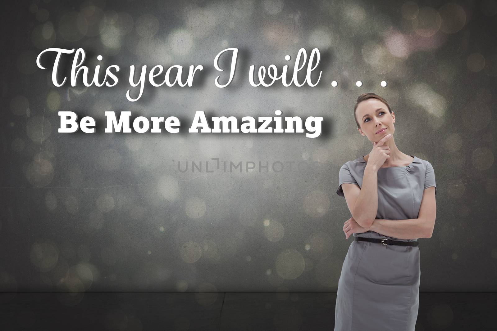 Composite image of thoughtful woman posing in dress  by Wavebreakmedia