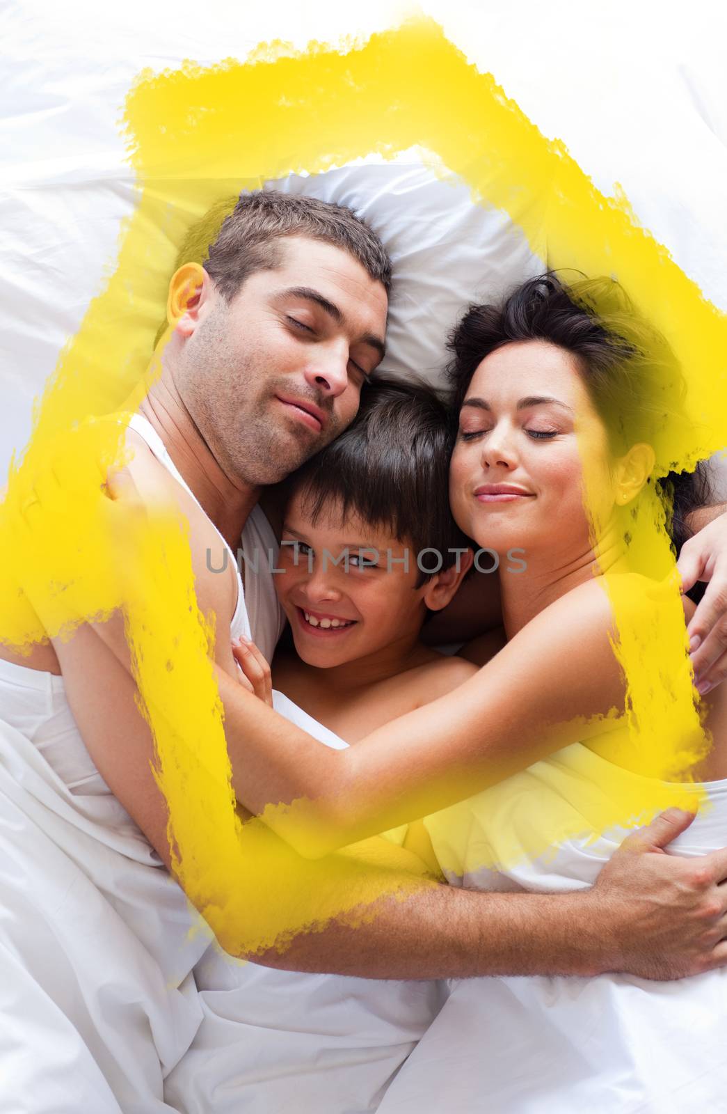 Happy family lying in bed  against house outline in clouds