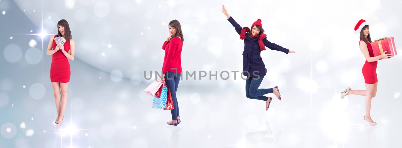 Composite image of festive brunette holding gift bags by Wavebreakmedia