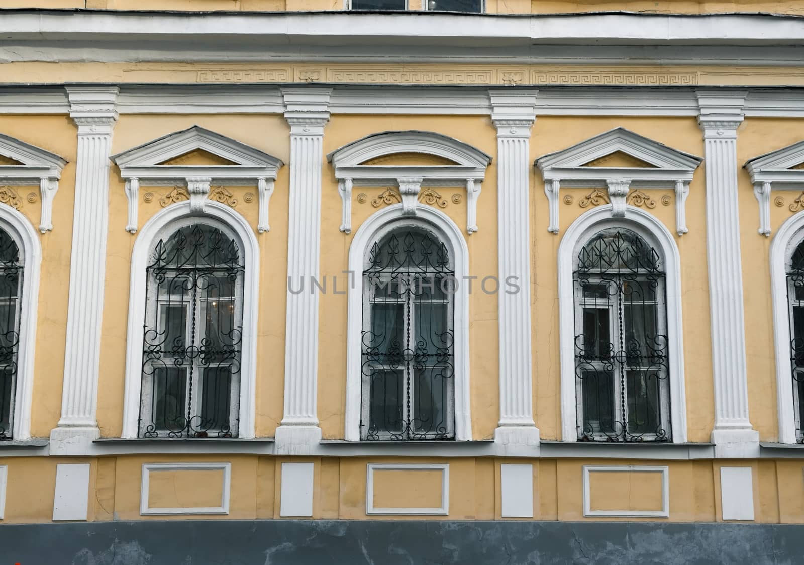 The windows on the facade of an old Moscow mansion