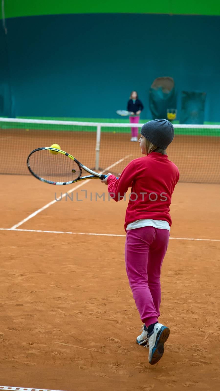 Children at school during a dribble of tennis