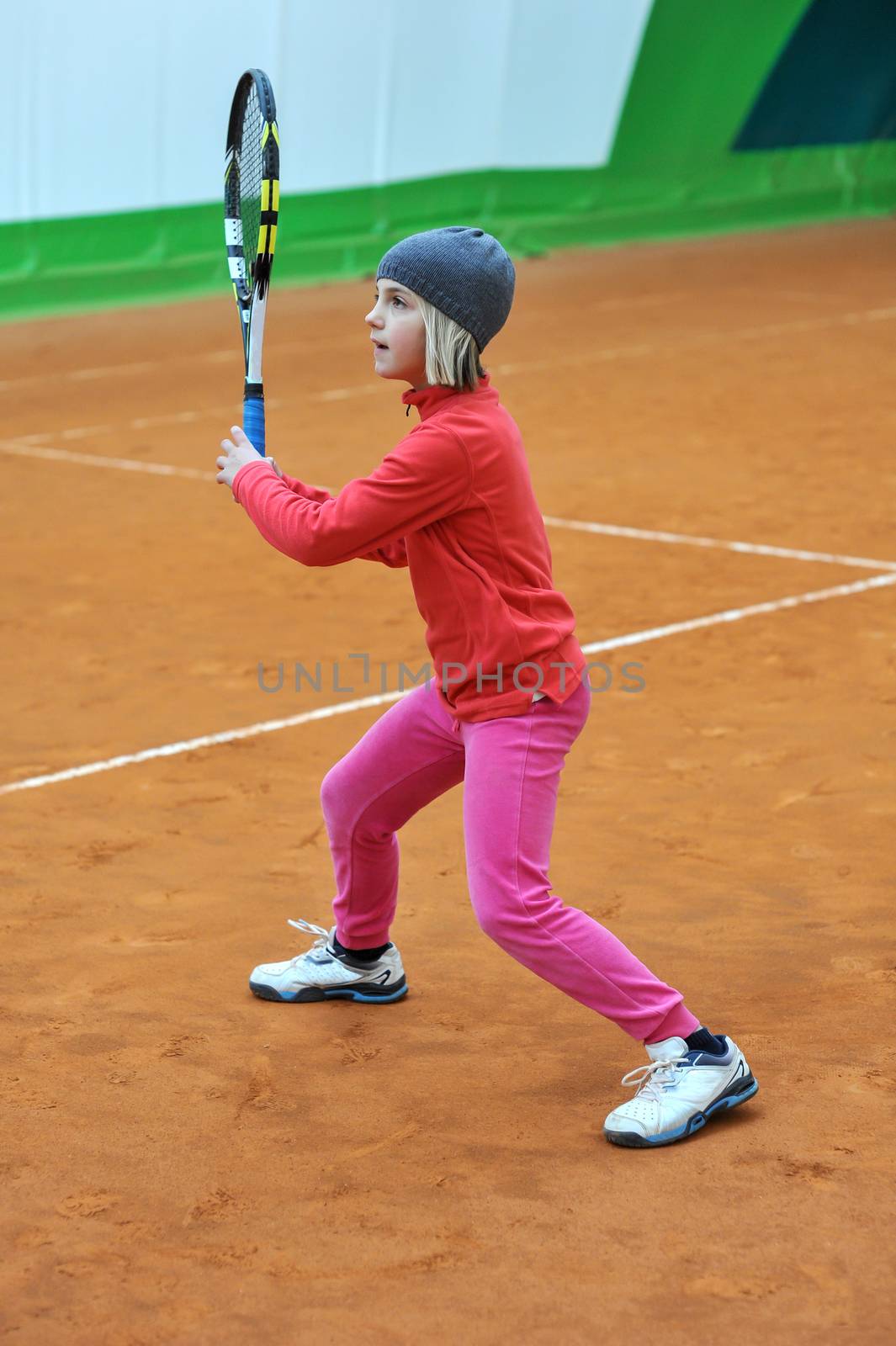 Children at school during a dribble of tennis