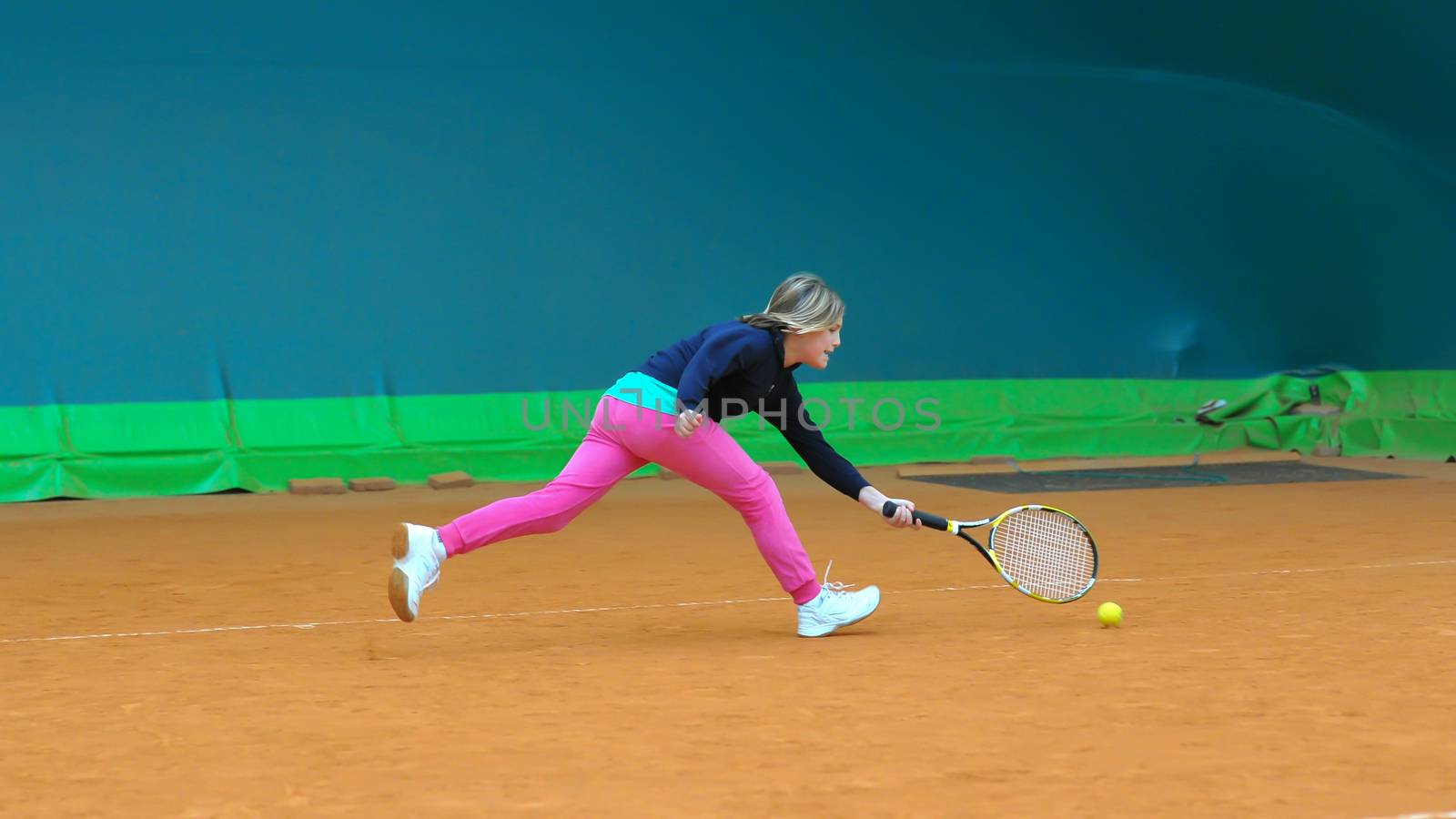 Children at school during a dribble of tennis