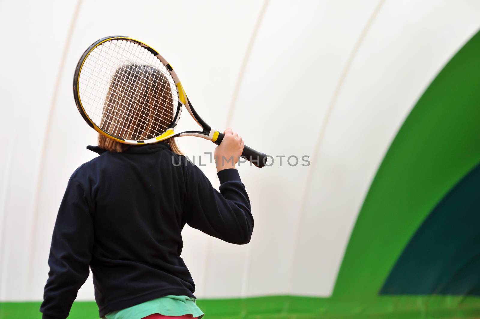 Children at school during a dribble of tennis