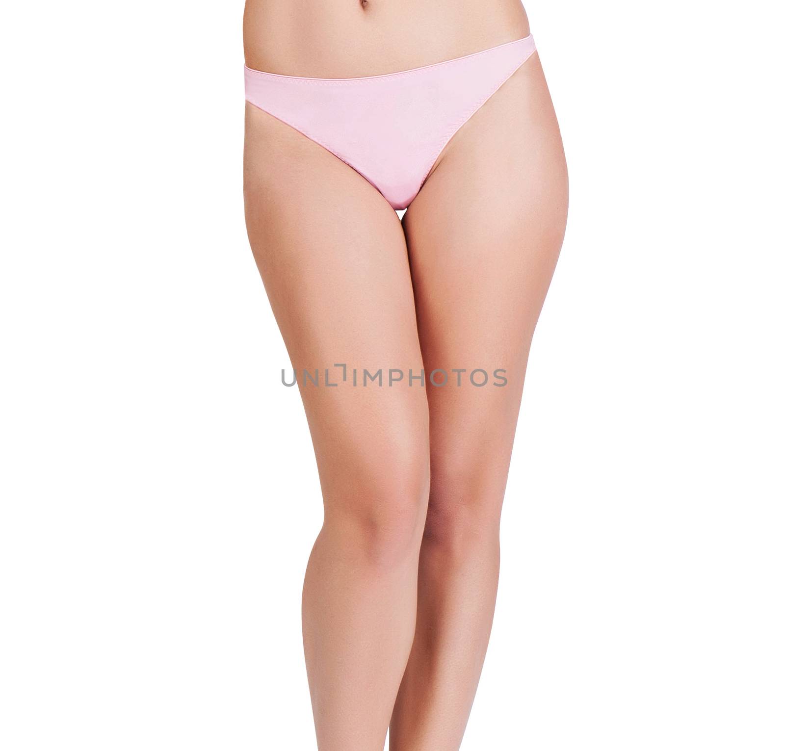 Woman legs on a white background closeup isolated