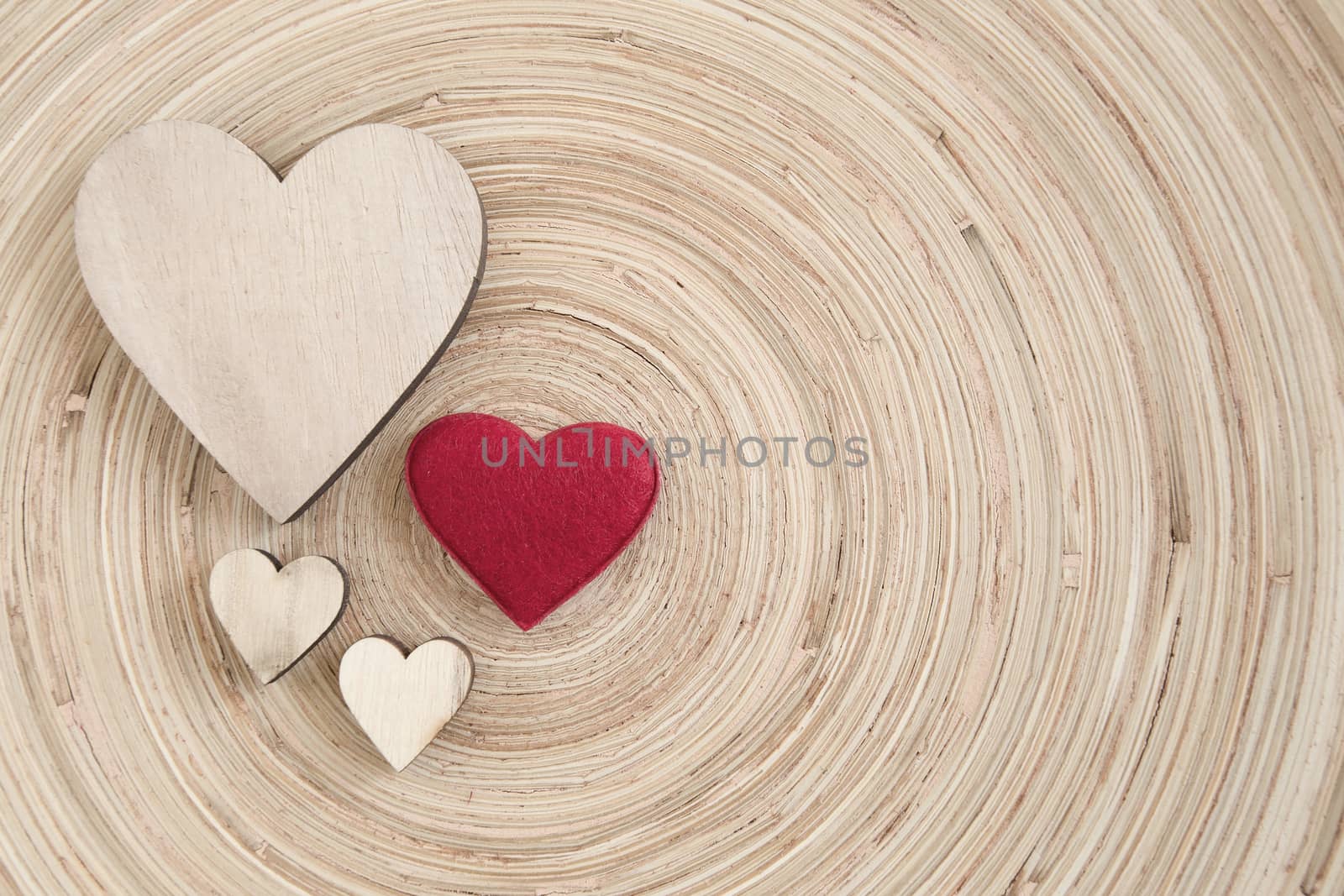 valentine's wooden hearts on a wooden background , valentine's day, day valentine postcard with space for text