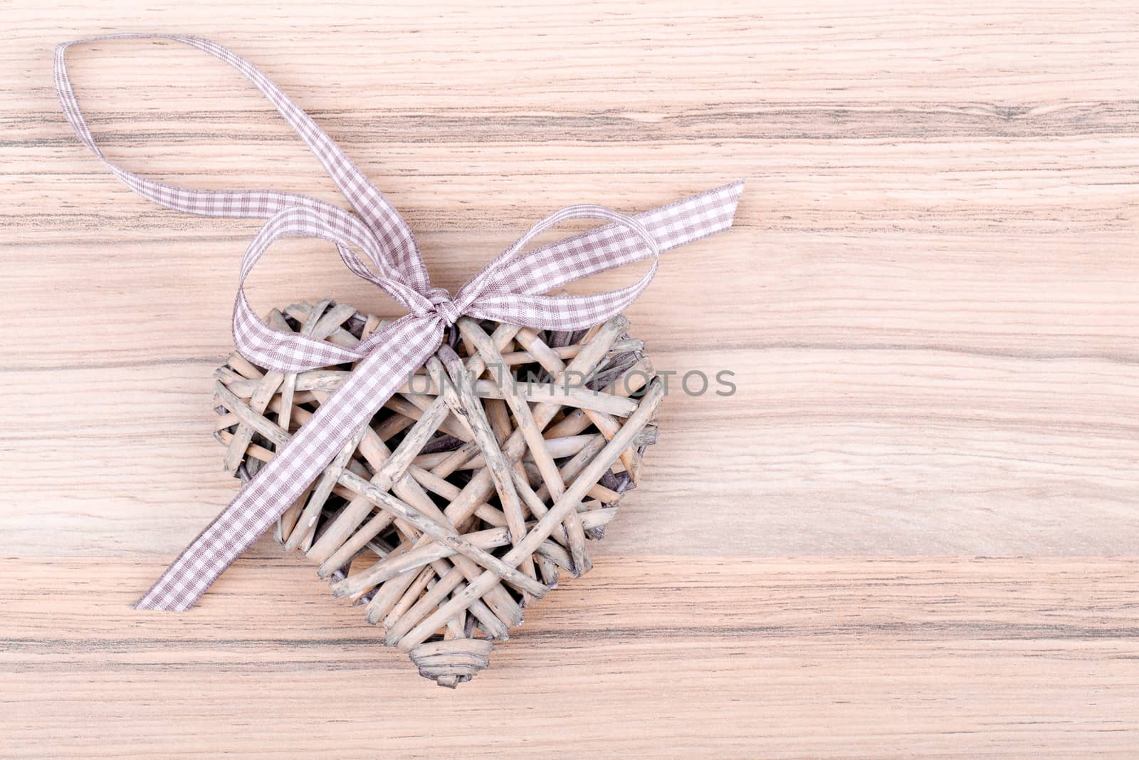 valentine's wooden heart on wooden background , valentine's day , day valentine postcard with space for text