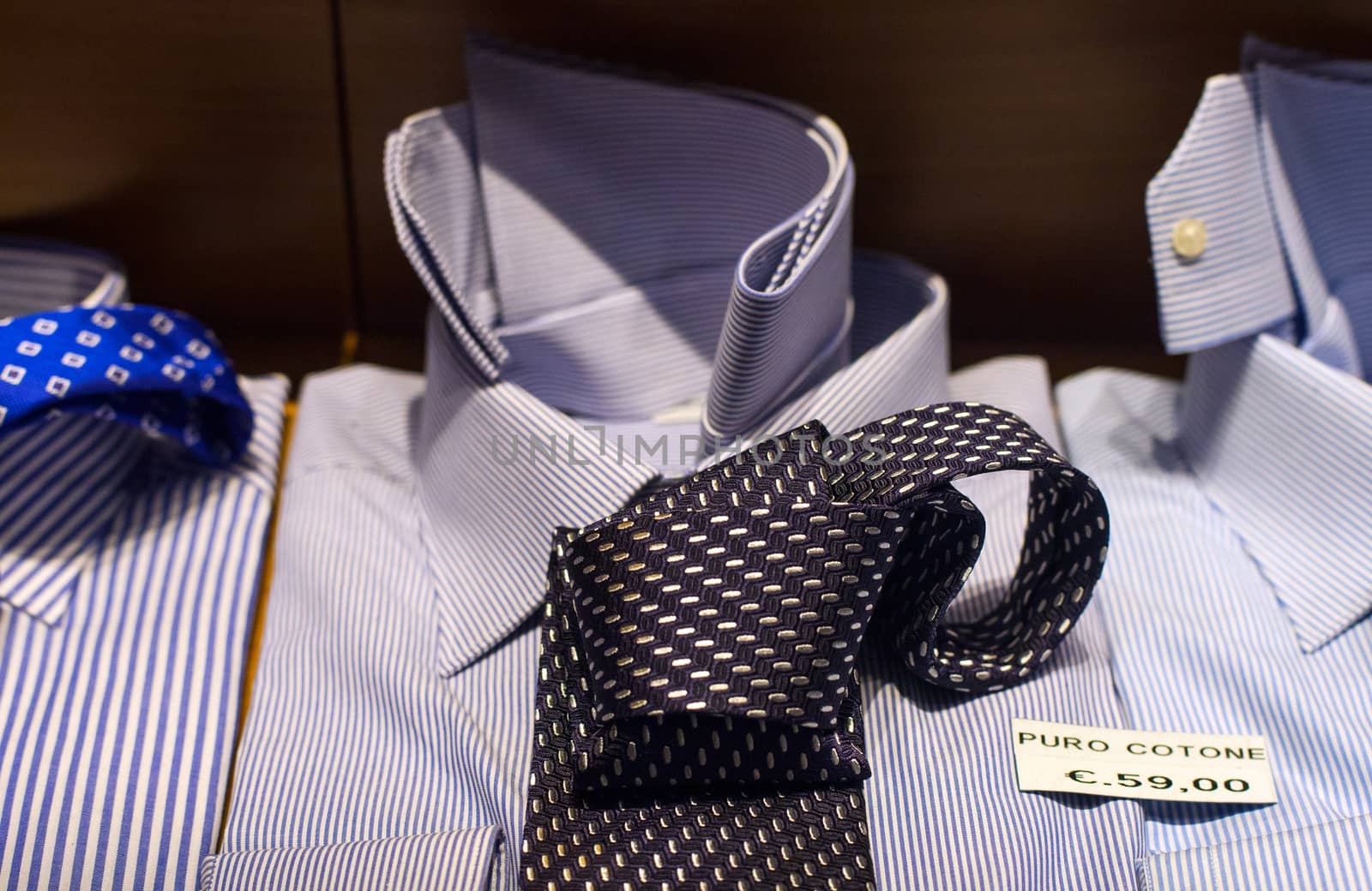 Close up of male shirts exposed in the clothes shop