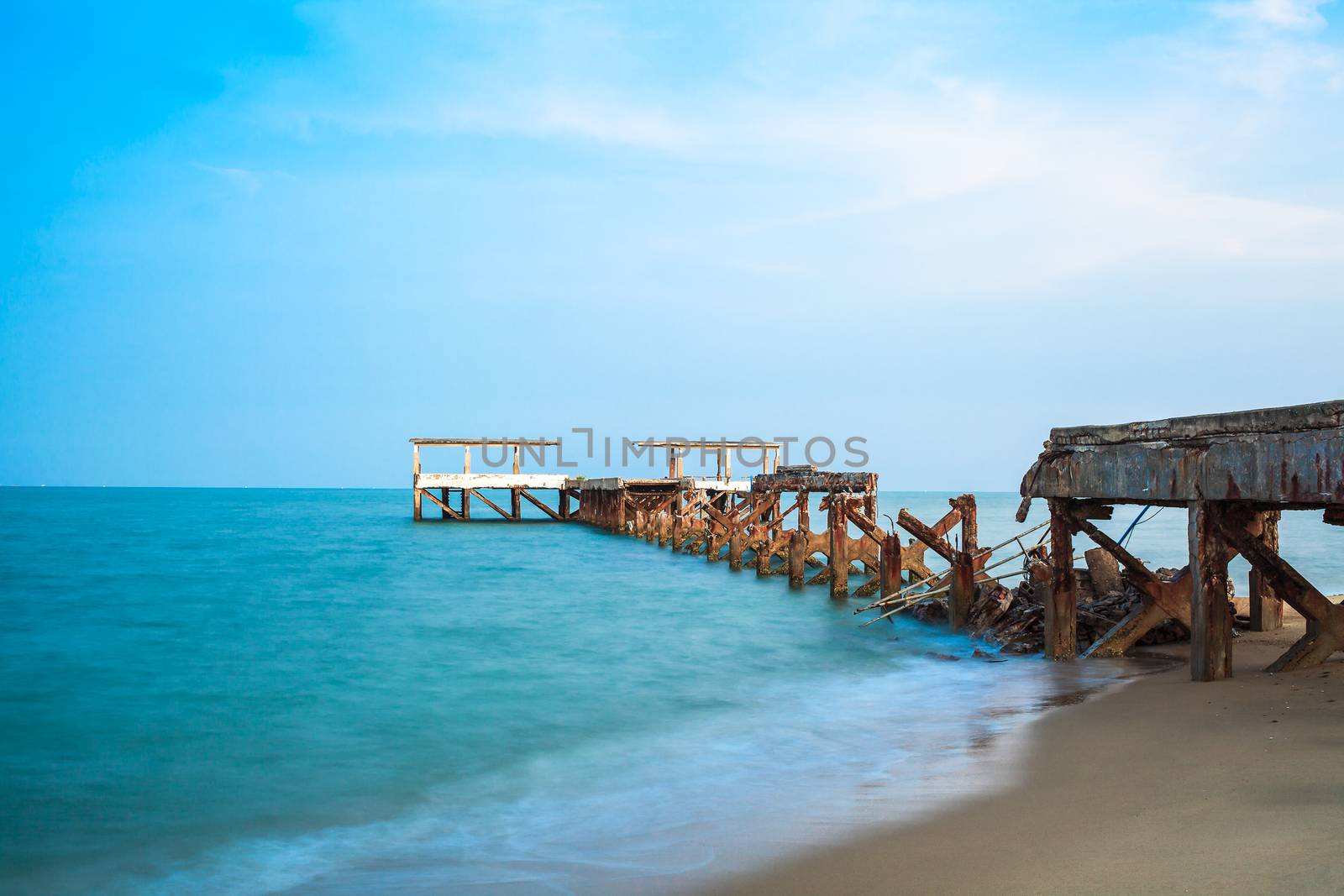 old Jetty damage at sand beach