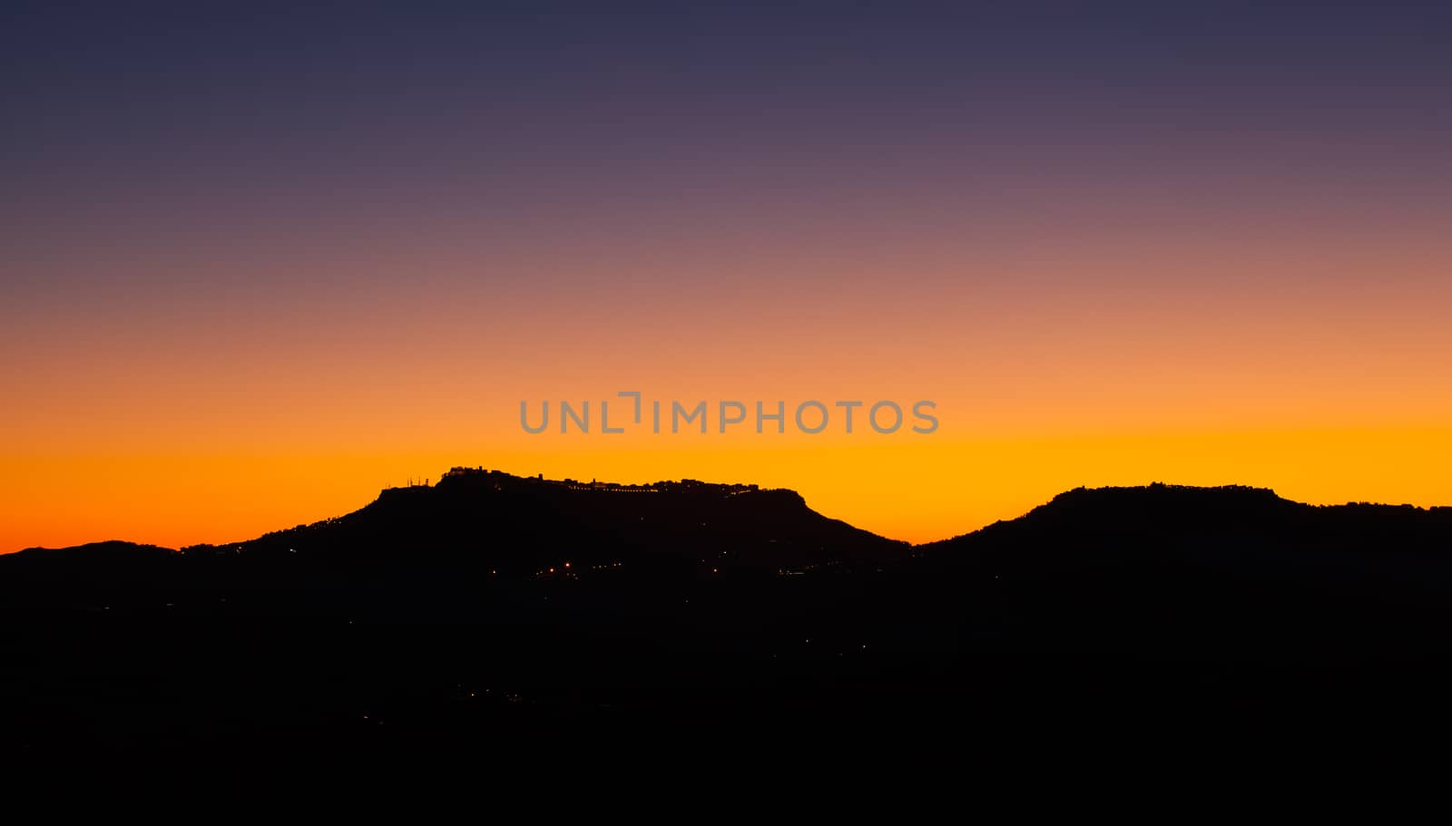 View of Enna and Calascibetta skyline at sunset
