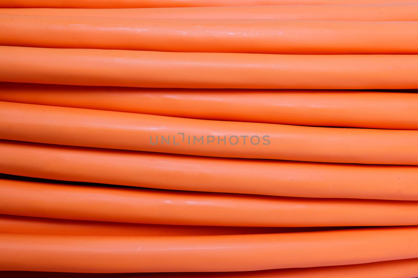 detail of multimode orange fiber optic cable background