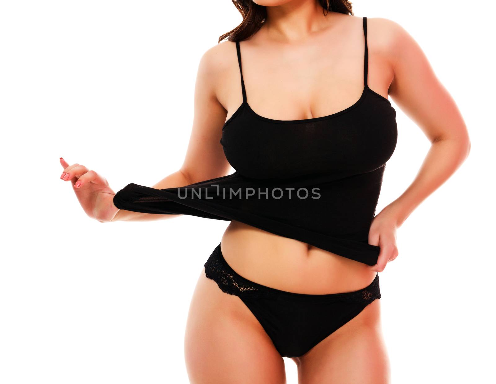 Woman with sexy body posing against a white background, isolated, copyspace