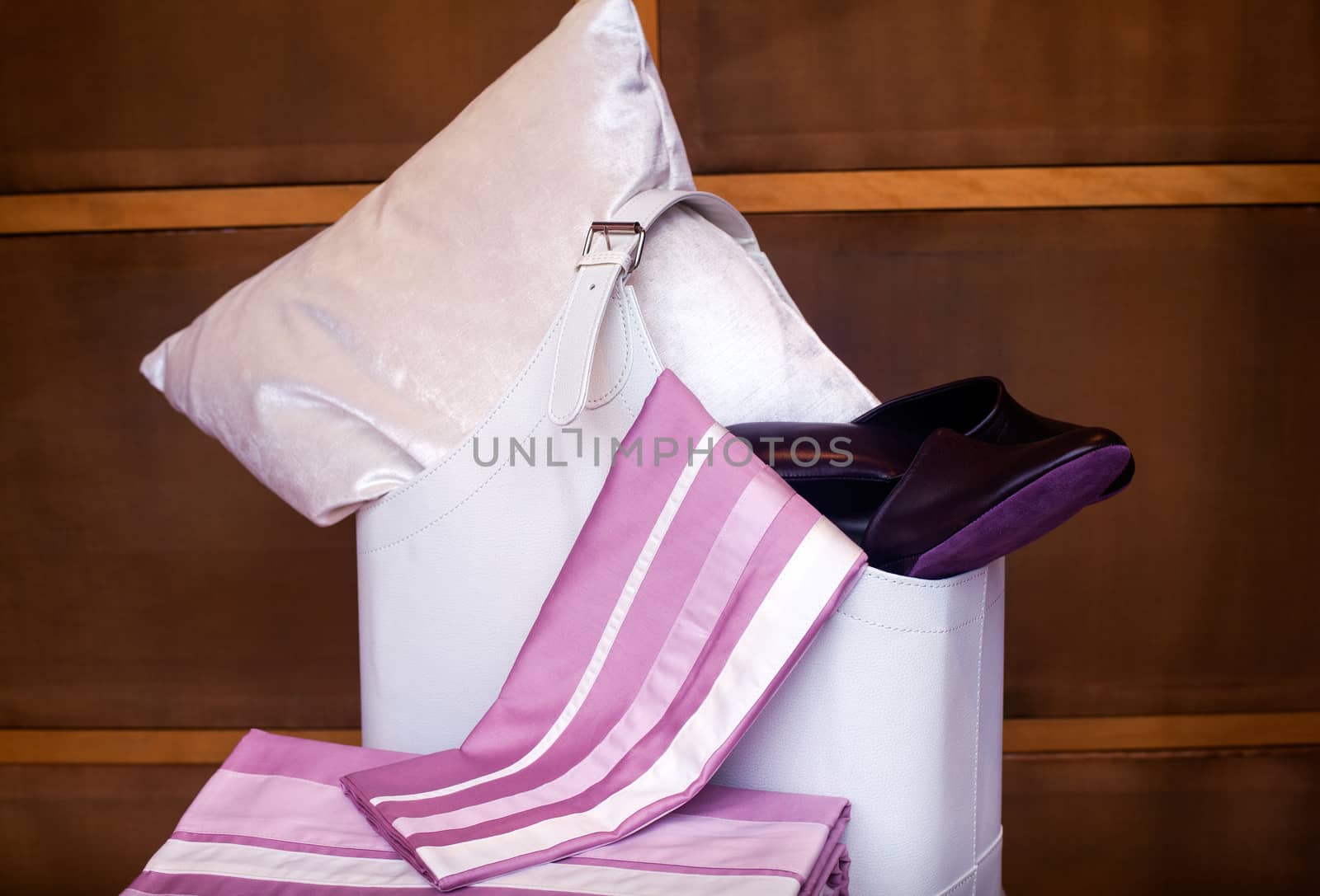 View of female slippers and bedroom accessories
