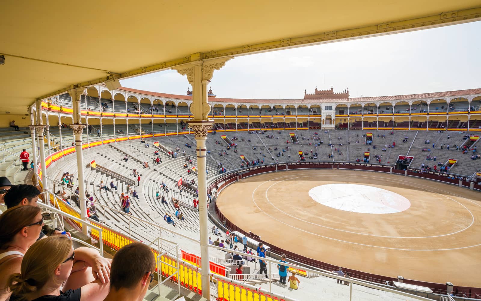 Madrid, Spain - May 11, 2012: Plaza de Toros de Las Ventas interior view with tourists gathering for the bull show in Madrid on a sunny day, Spain