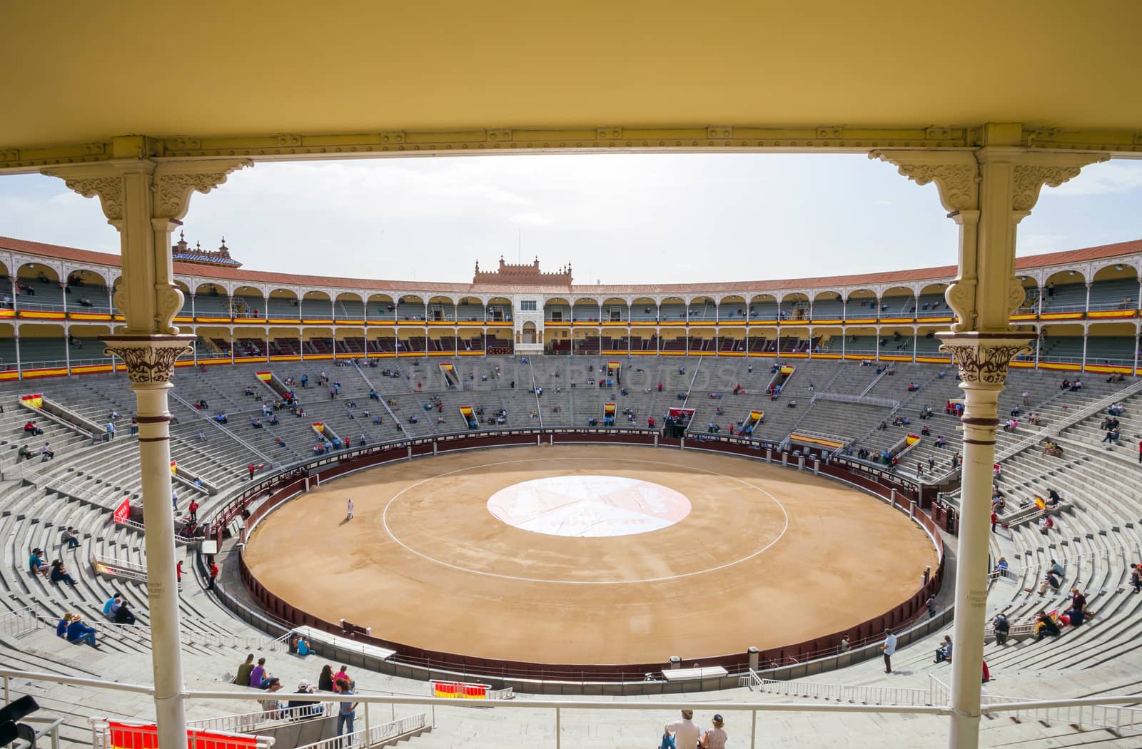 Madrid, Spain - May 11, 2012: Plaza de Toros de Las Ventas interior view with tourists gathering for the bull show in Madrid on a sunny day, Spain