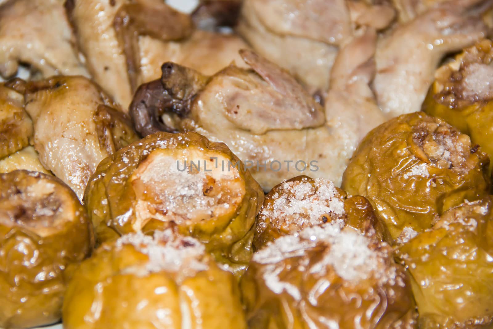 quail on apples with honey and nuts