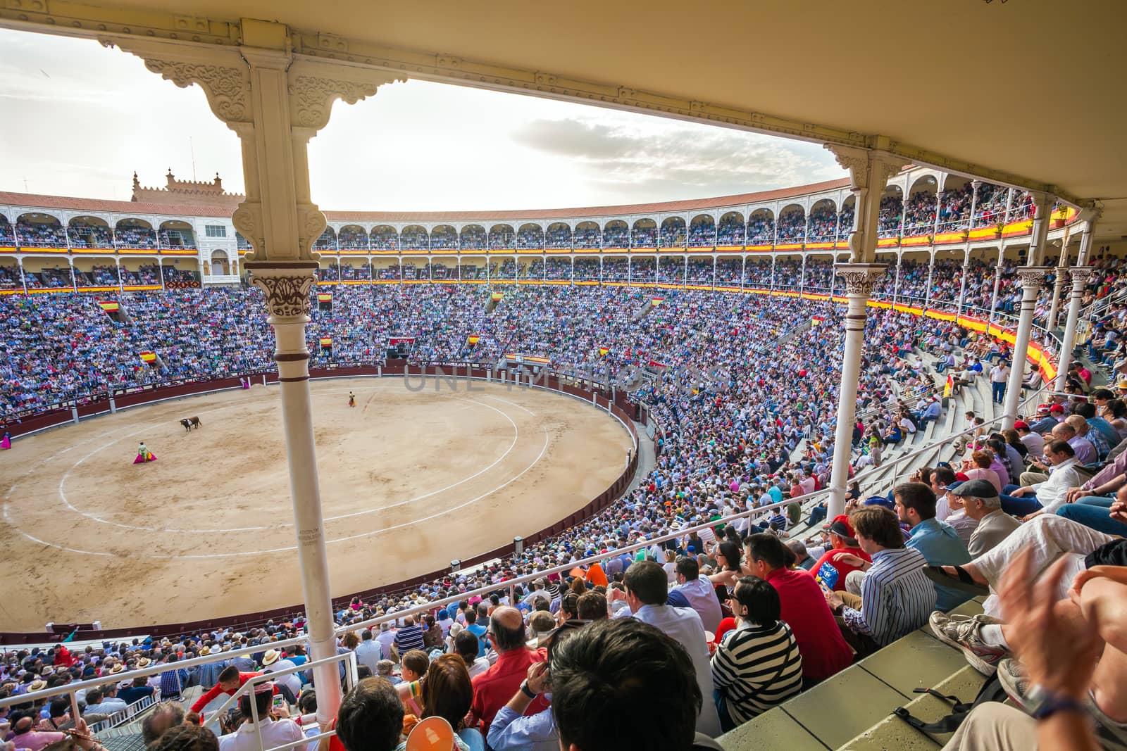 Madrid, Spain - May 11, 2012: Plaza de Toros de Las Ventas interior view with tourists gathered for the bull show in Madrid on a sunny day, Spain