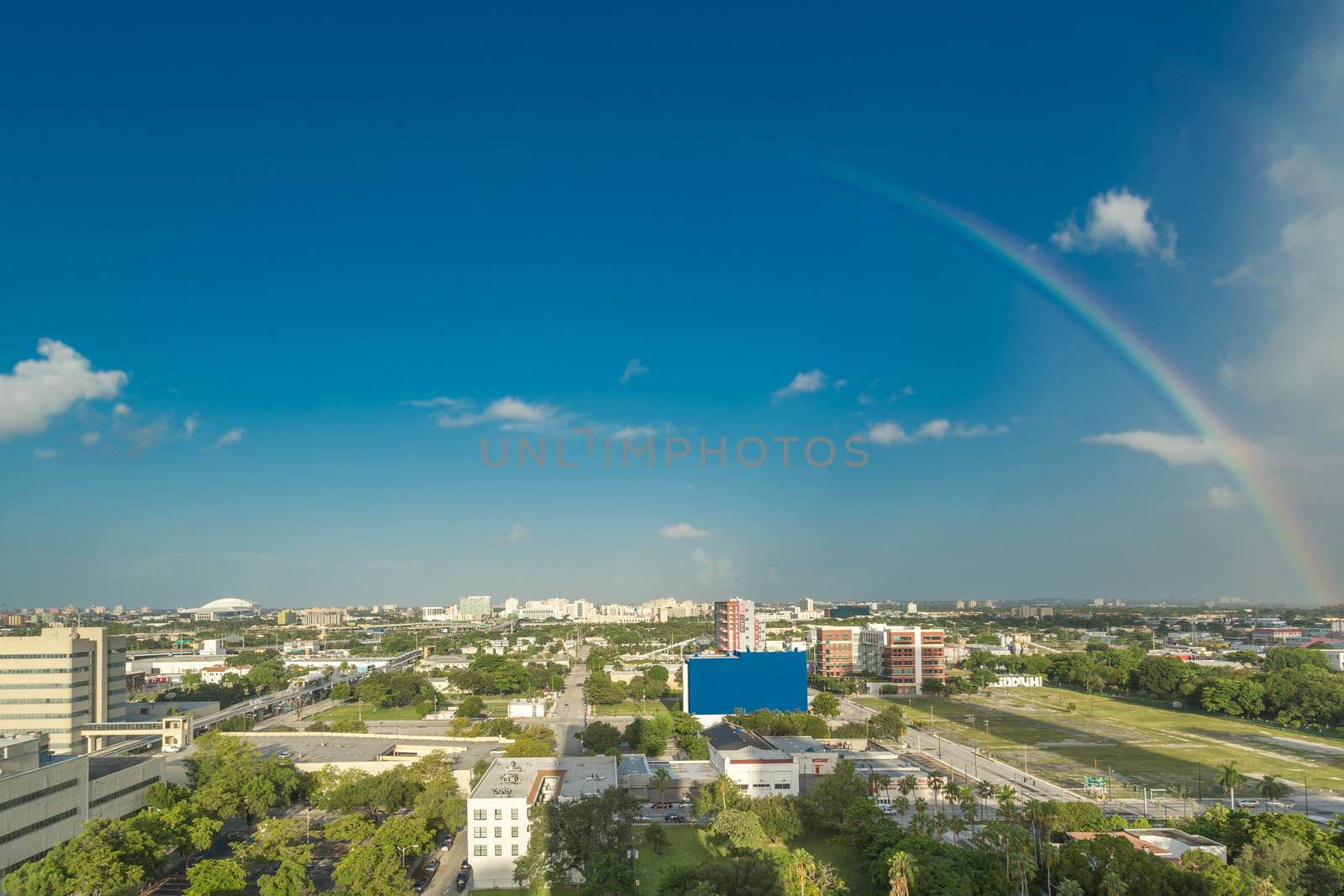 Rainbow over Downtown Miami by derejeb