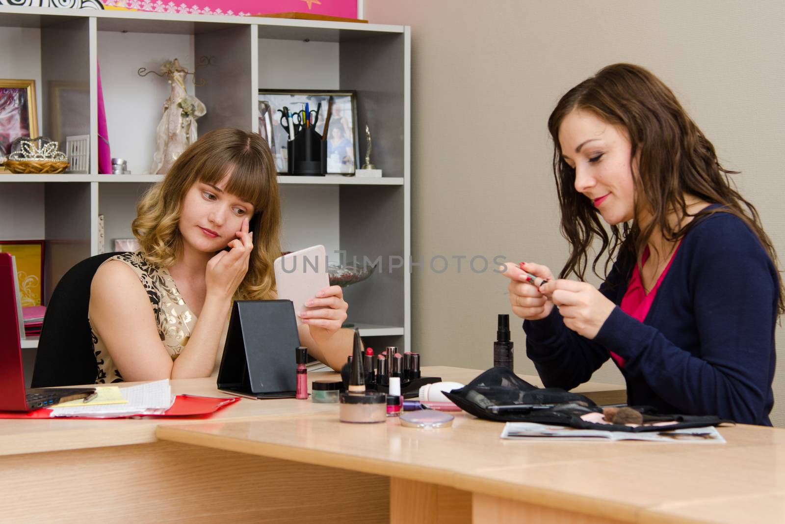 Beauty Consultants offers cosmetics client in the office