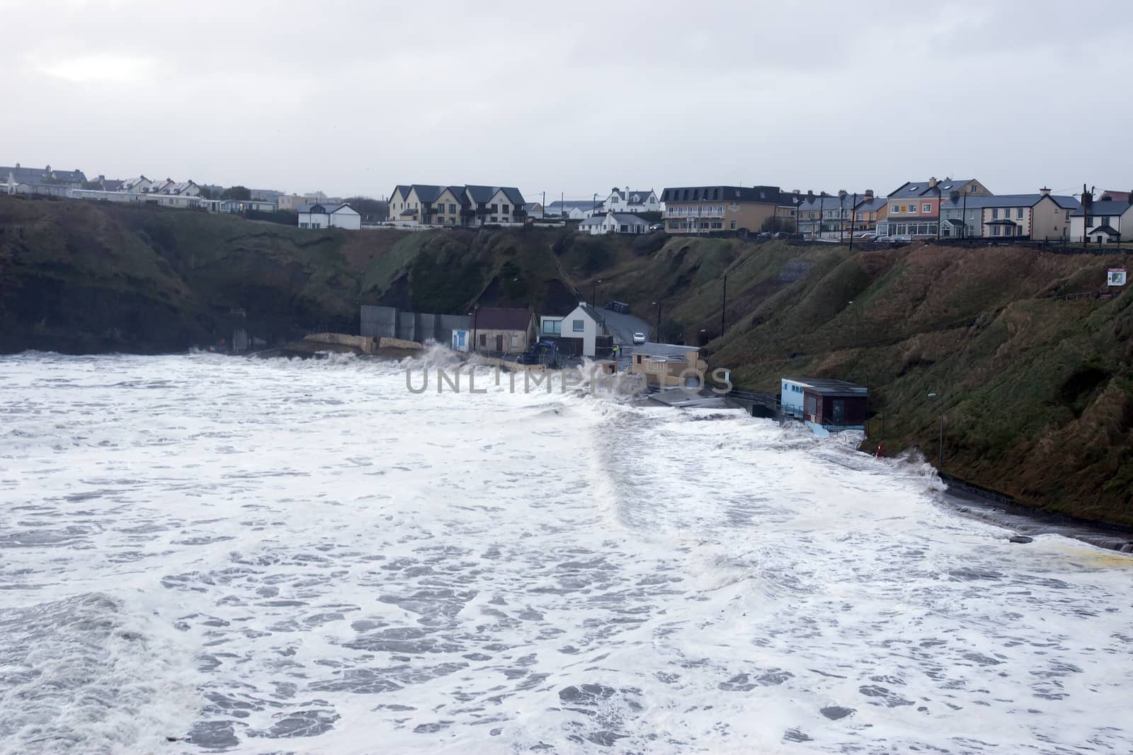 Ballybunion seaside beach and cliffs during a very bad storm with crashing waves