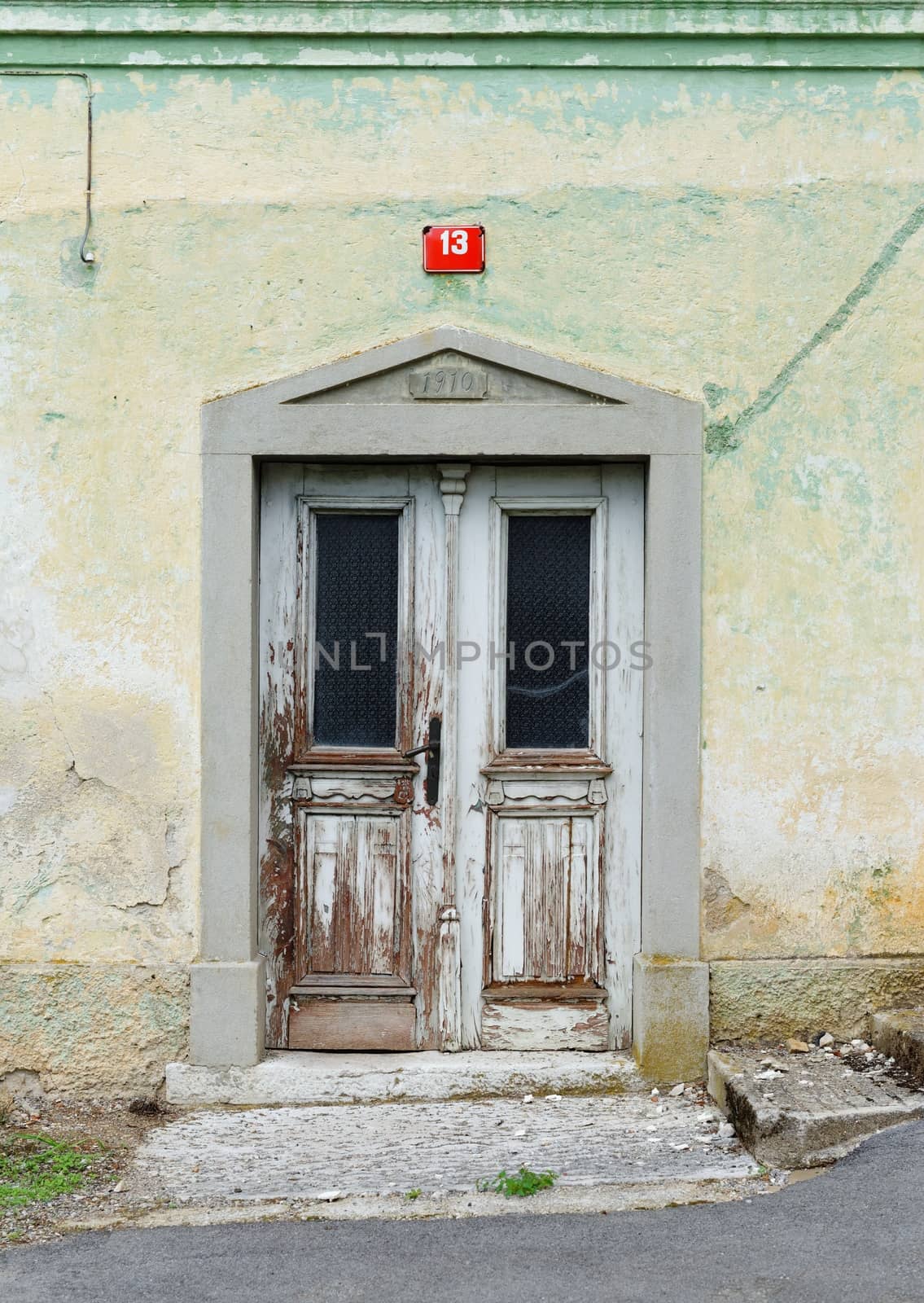 Old 1910 year house door with number 13