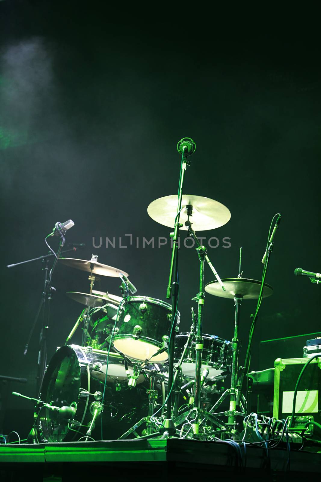 Drums on stage with on black background