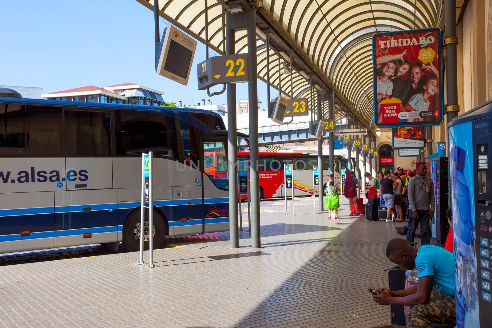 Spain, Catalonia, JUNE 14, 2013: Barcelona Bus Terminal Estacio Nord, apron with buses and passengers