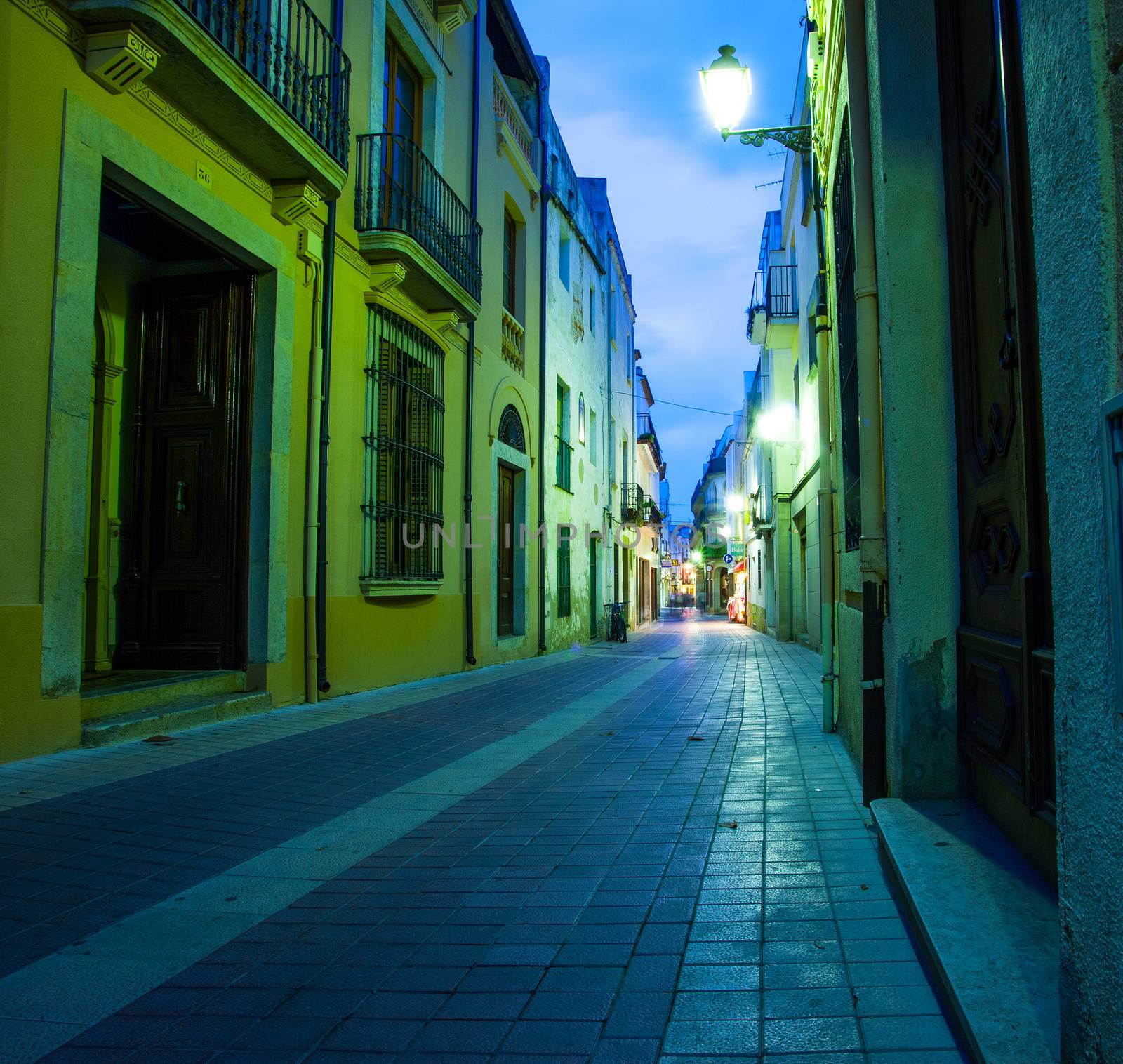 Tossa de Mar, Catalonia, Spain, 18.06.2013, old town street lights illuminated at night, editorial use only