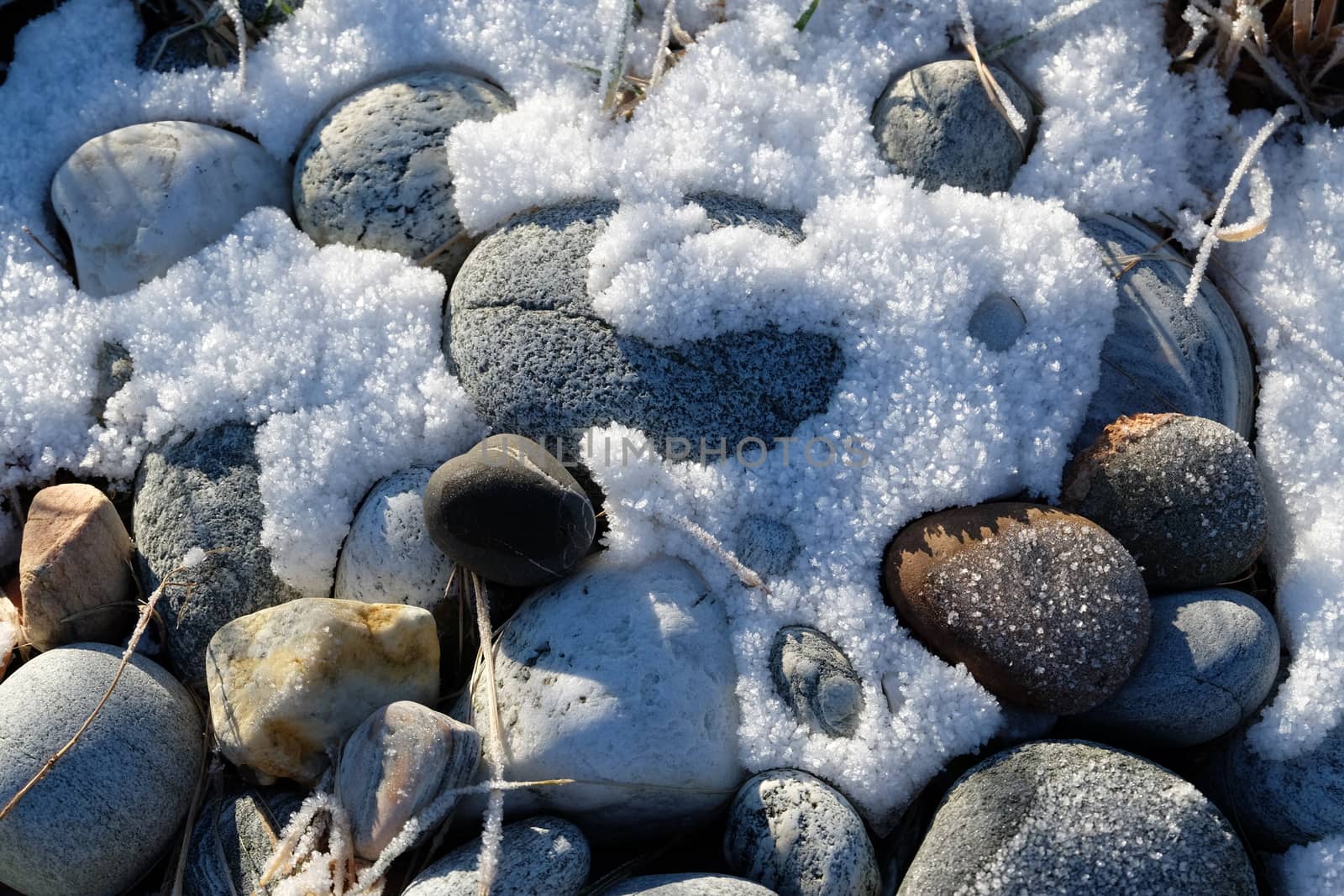 Stones and snow by Afoto