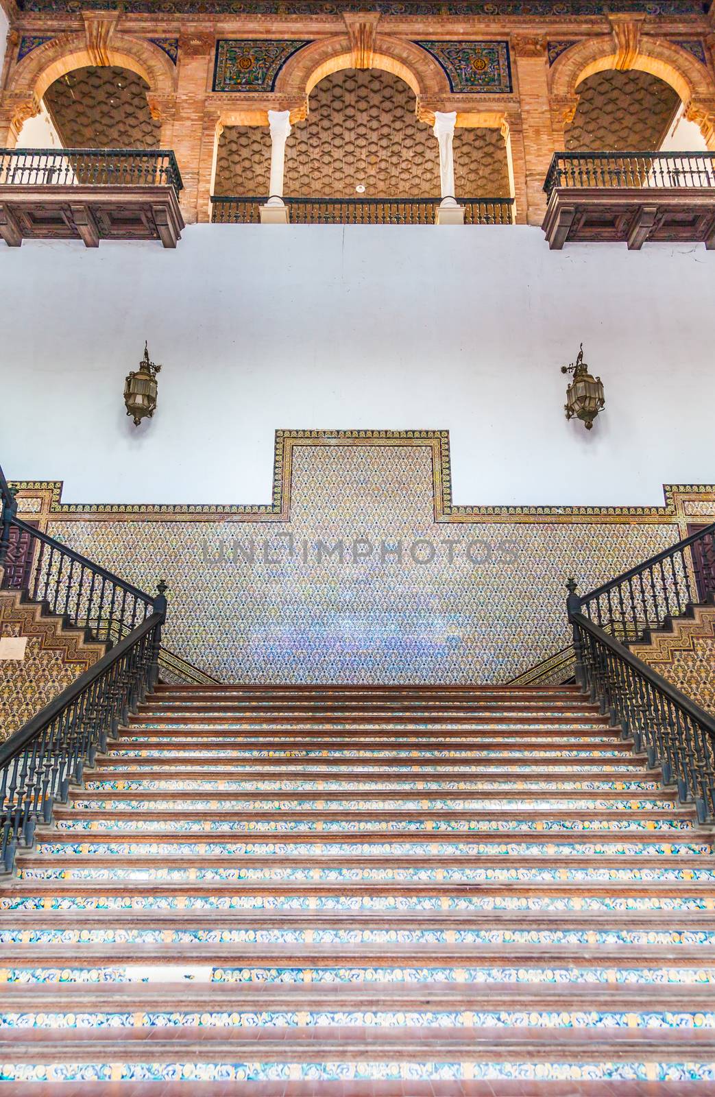 Saville, Spain. Old Spanish Renaissance Revival staircase made of marble and wood.